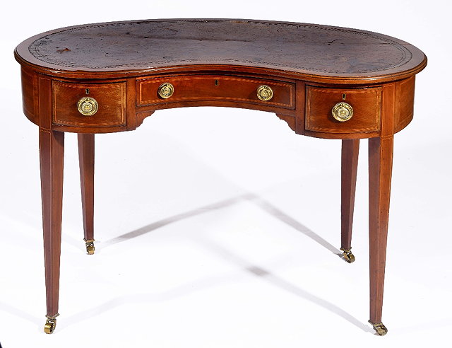 Appraisal: Late th Century mahogany and inlaid kidney shaped tablewith three