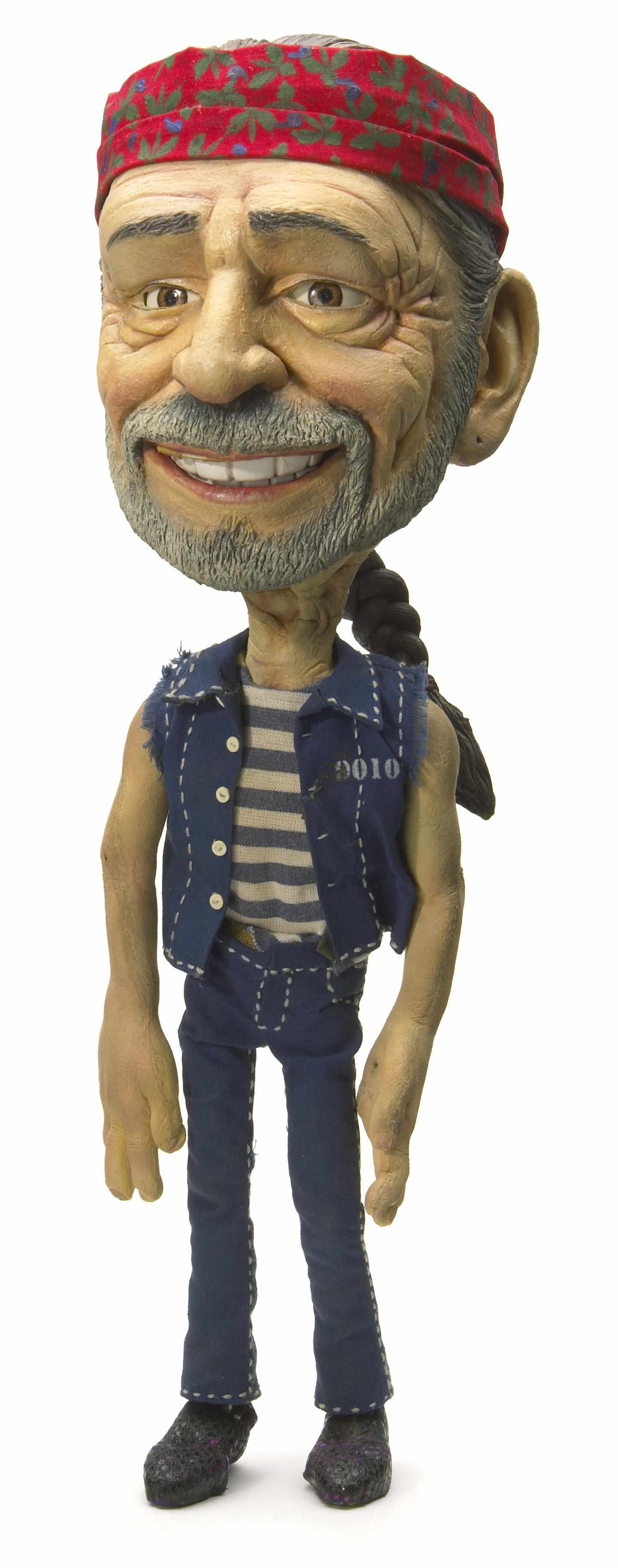 Appraisal: Willie Nelson commercial puppet A fully articulated painted foam over