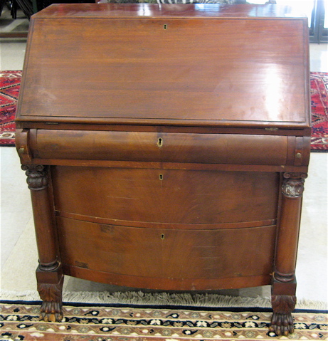 Appraisal: EMPIRE REVIVAL MAHOGANY SECRETARY American c the slant top and