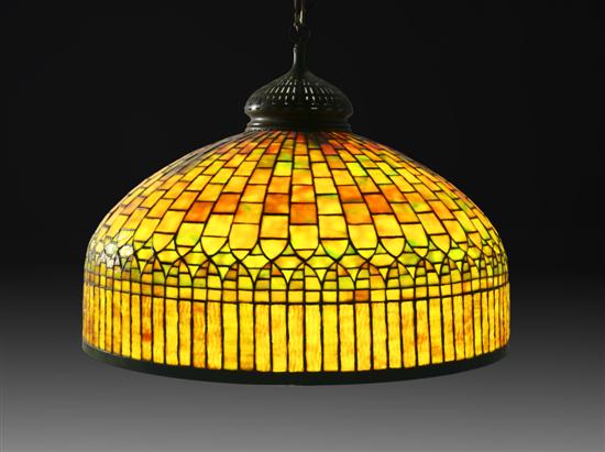 Appraisal: A Tiffany Favrile Glass and Bronze Curtain Border Lamp Shade