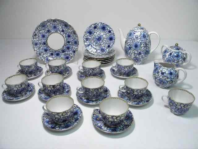 Appraisal: Lomonosov Russian porcelain gilt tea set Blue and gilt floral