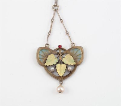 Appraisal: An Art Nouveau silver gilt pendant Centred with three leaves