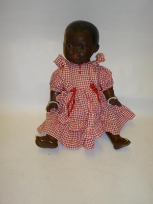 Appraisal: An Armand Marseille bisque head black baby doll with brown