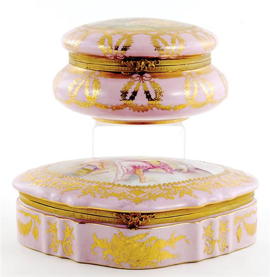 Appraisal: Two French-style porcelain boxes each painted with central scene and