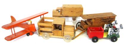 Appraisal: Group of hand-made wooden vehicles Including an orange painted bi-plane