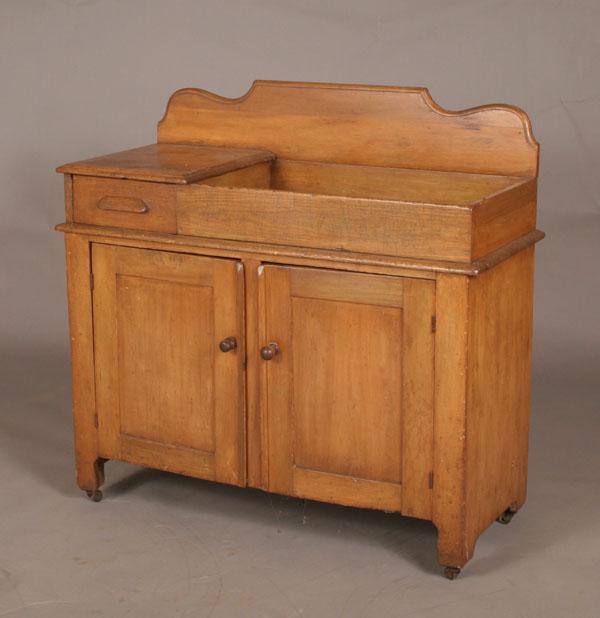 Appraisal: Primitive mixed woods dry sink drawers above two doors below