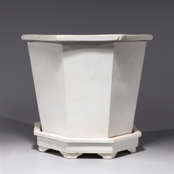 Appraisal: Chinese unglazed white octagonal porcelain planter with base stand overall