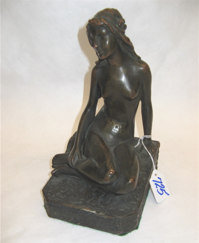 Appraisal: BRONZE FIGURE OF NUDE WOMAN SEATED on shaped base Height