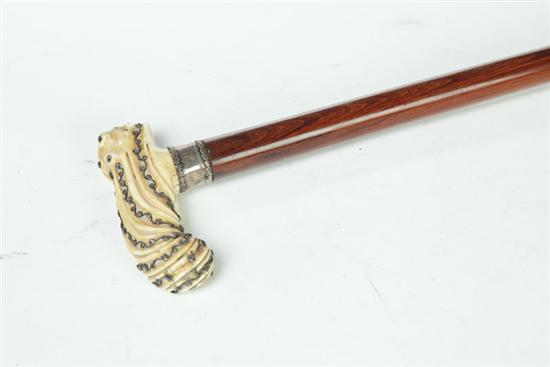 Appraisal: CANE American nd half- th century Ivory handle with silver