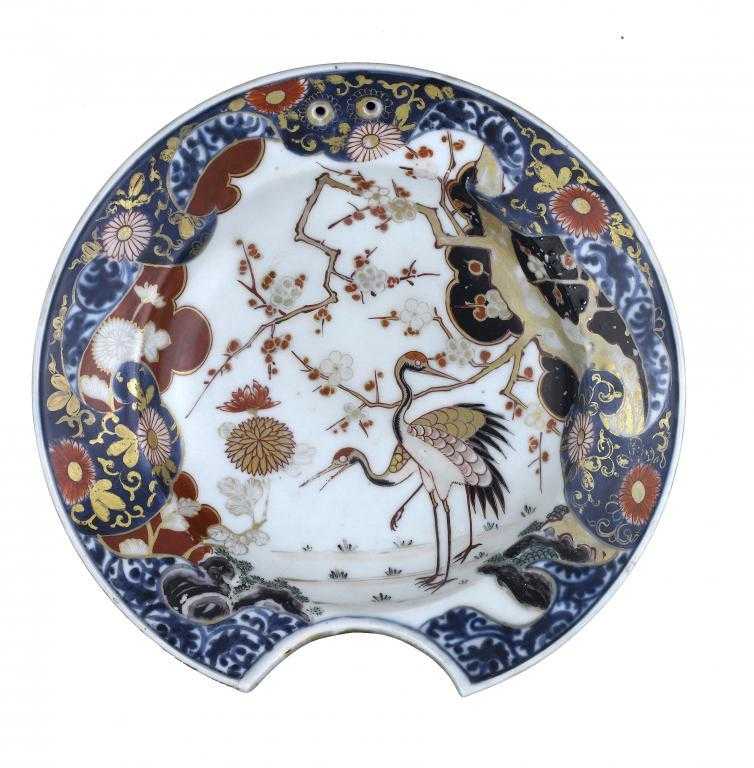 Appraisal: AN IMARI SHAVING BOWL typically enameled and richly gilt with