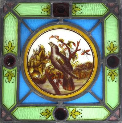 Appraisal: A stained glass panel circa depicting a bird in song