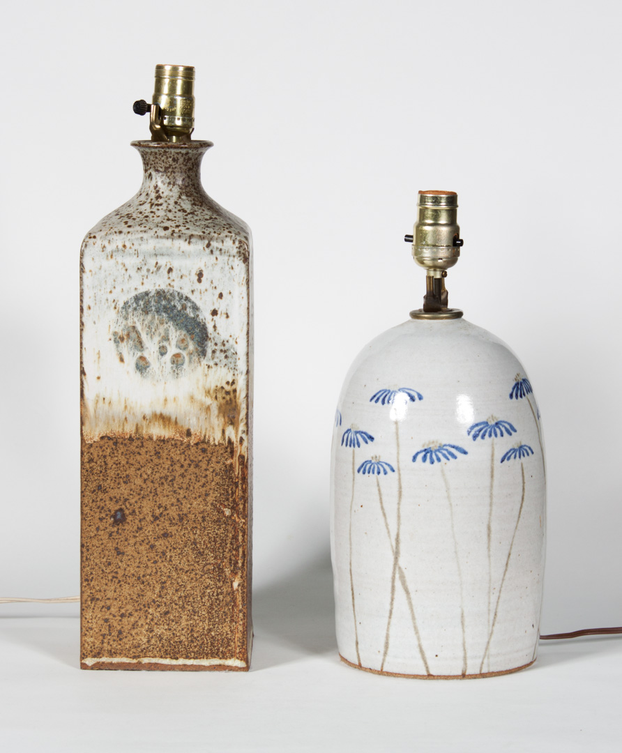 Appraisal: Two contemporary pottery lamps square paneled bottle mounted as lamp