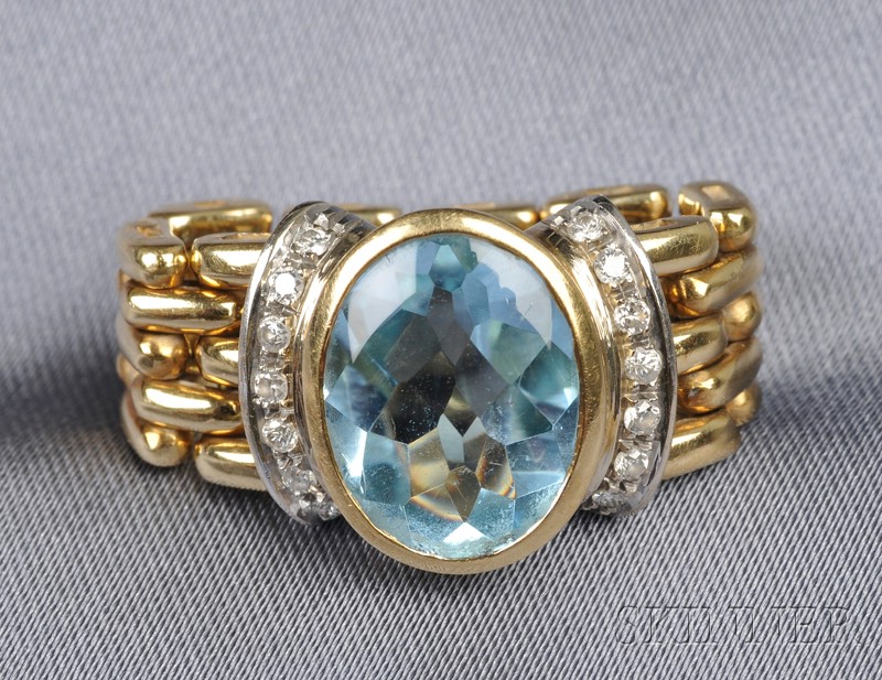 Appraisal: kt Gold Blue Topaz and Diamond Flexible Ring bezel-set with