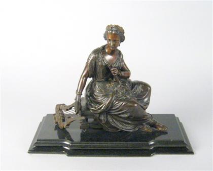 Appraisal: French bronze figure of a classical woman emblematic of Music