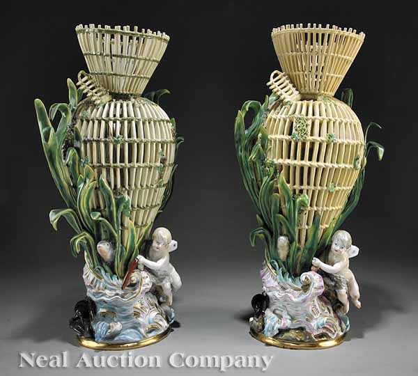 Appraisal: A Near Pair of Meissen Polychrome and Gilt-Decorated Reticulated Porcelain