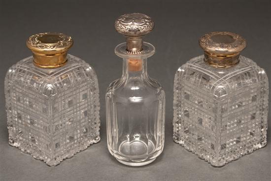 Appraisal: Pair of English cut glass cologne bottles with engraved caps