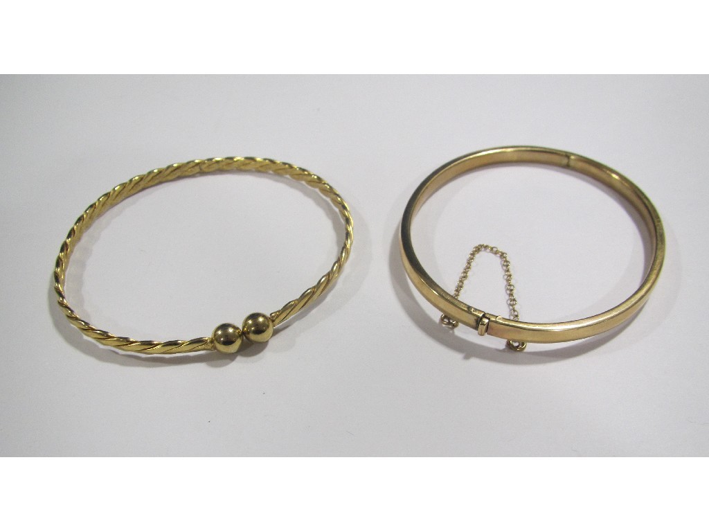 Appraisal: Two ct gold bangles Approximately gms