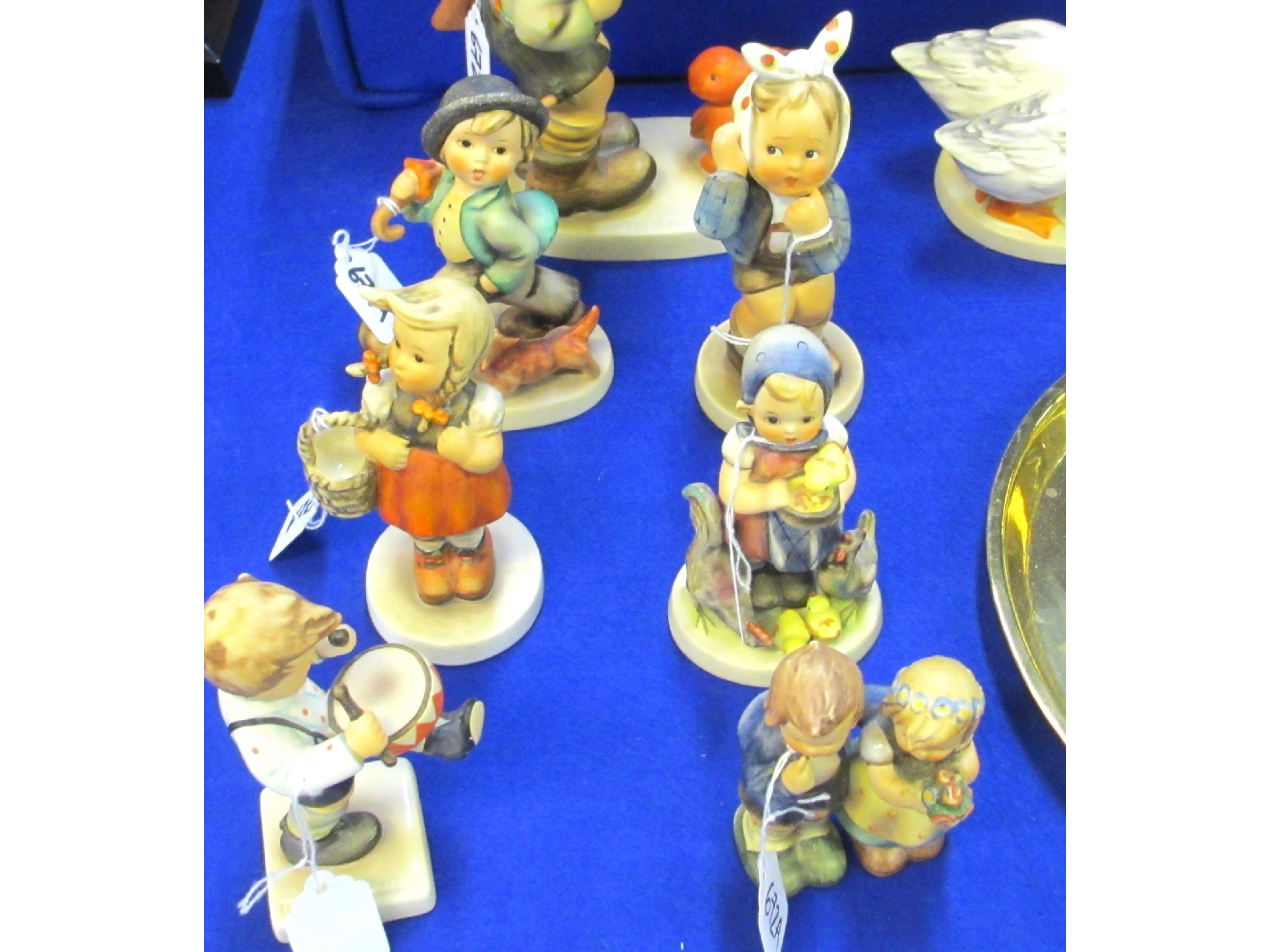 Appraisal: Six Hummel figures including We Congratulate Little Drummer Little Shopper