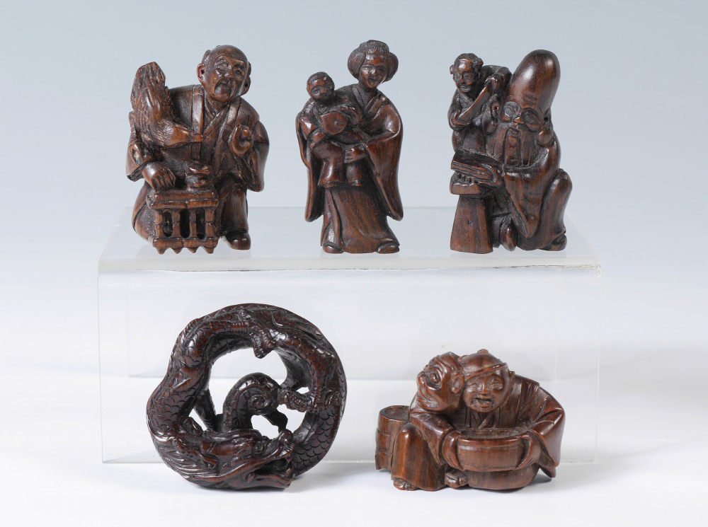 Appraisal: PIECE COLLECTION OF CARVED WOOD NETSUKE Japanese netsukes to include