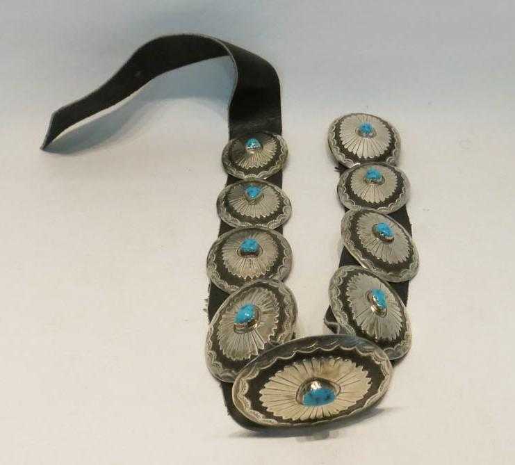 Appraisal: NATIVE AMERICAN STERLING CONCHO AND LEATHER BELT having eight conchos