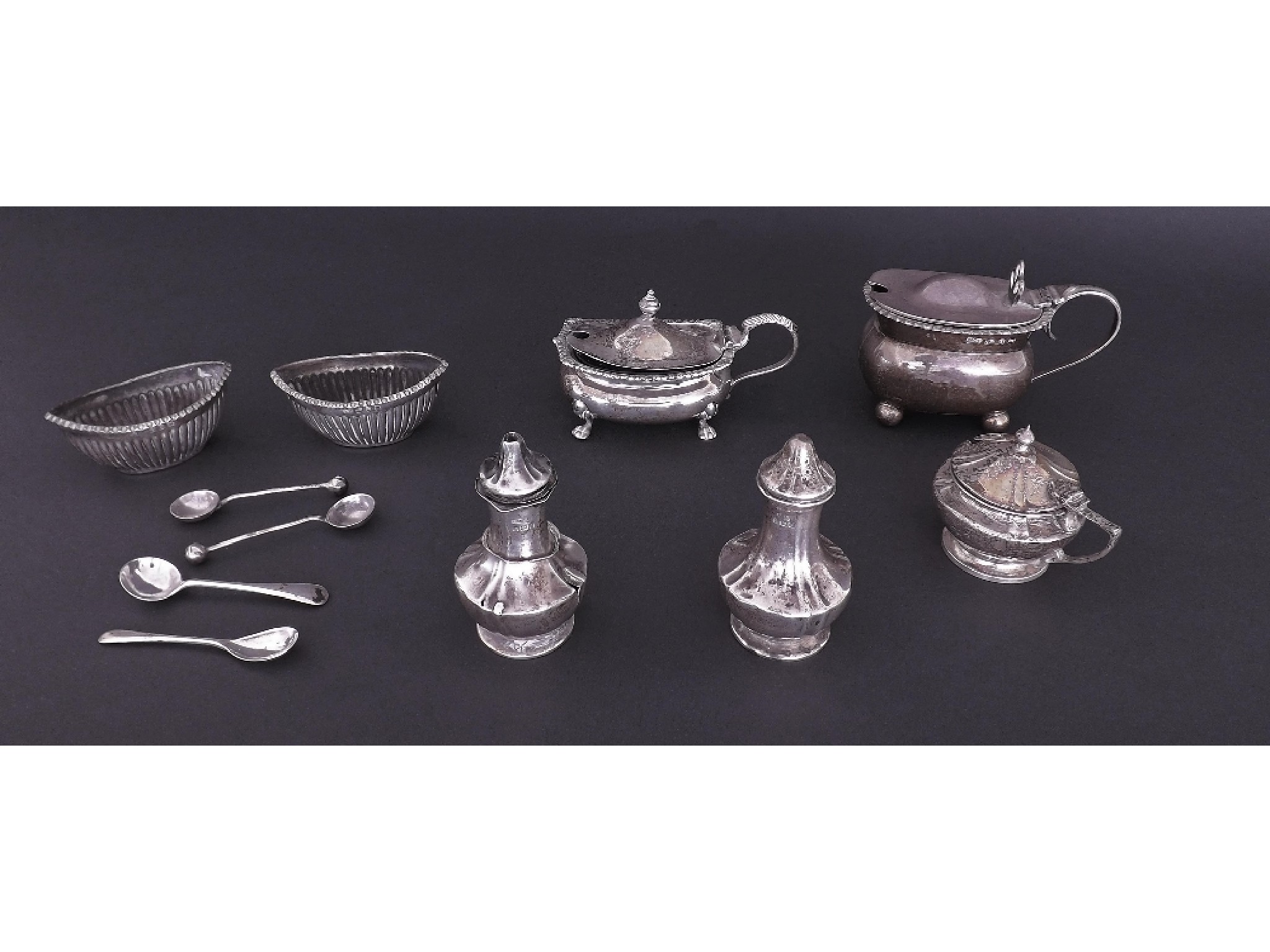 Appraisal: Collection of various silver cruet items to include salts mustards