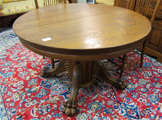 Appraisal: ROUND OAK PEDESTAL DINING TABLE WITH TWO LEAVES American c