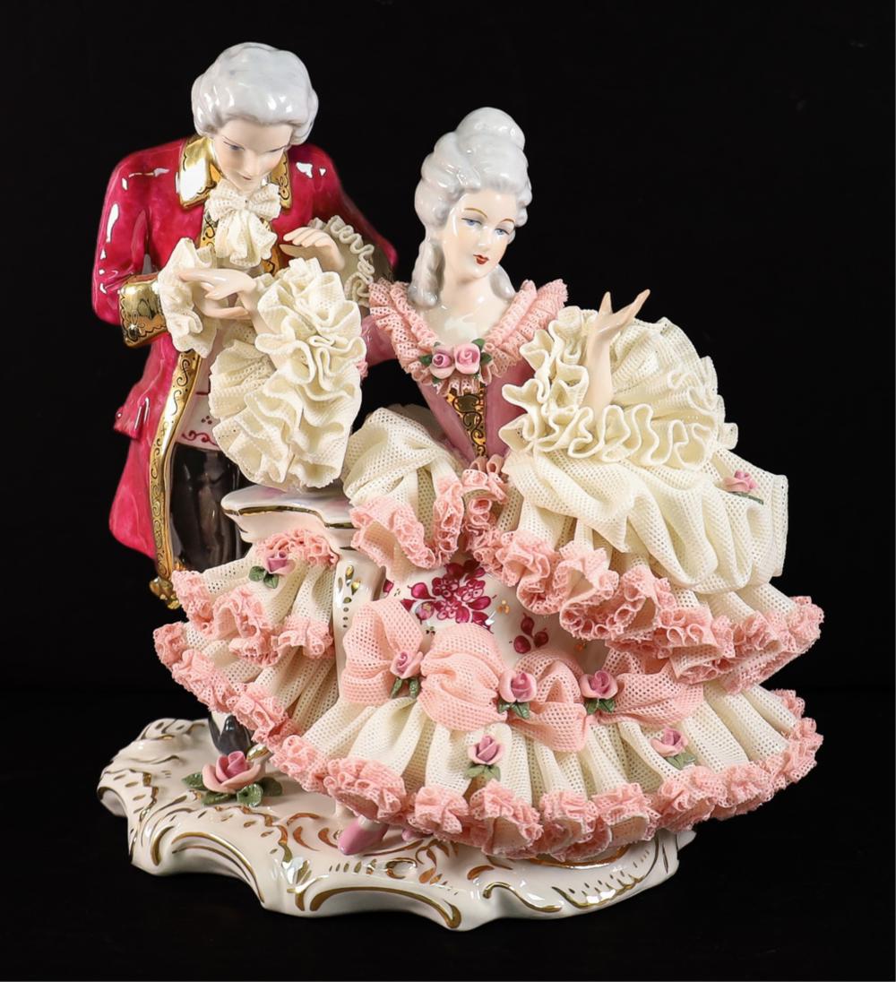 Appraisal: GERMAN DRESDEN LACE PORCELAIN FIGURAL GROUPGerman Dresden lace porcelain figural