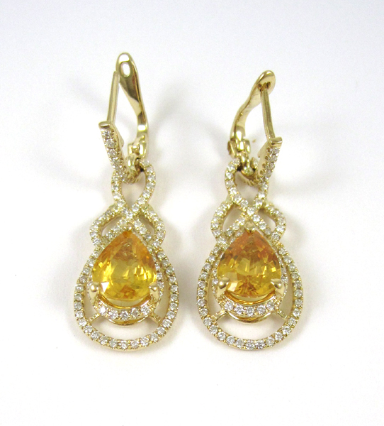 Appraisal: PAIR OF YELLOW SAPPHIRE AND DIAMOND EARRINGS with AGI appraisal