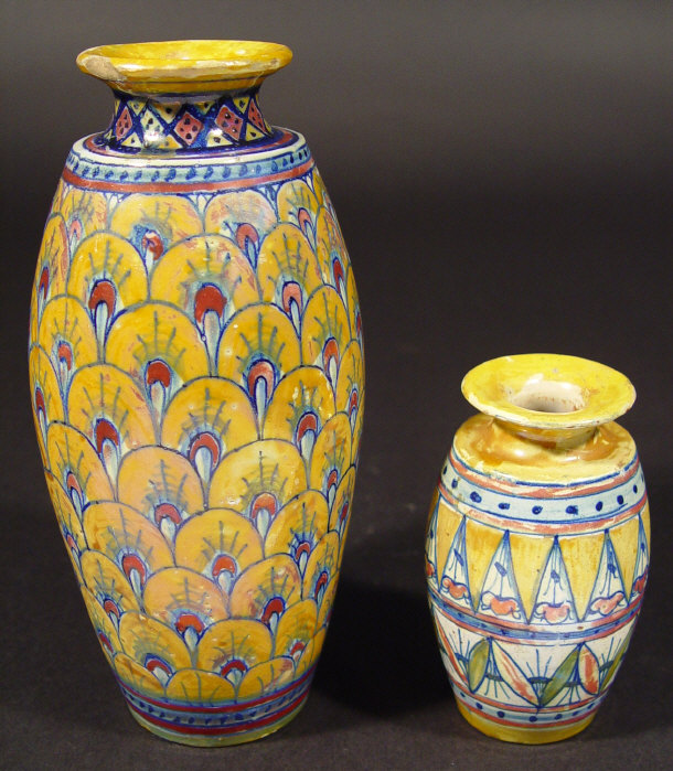 Appraisal: Two Isnik style pottery vases each decorated with peacocks and