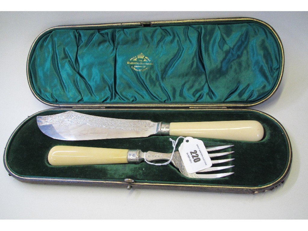 Appraisal: Cased pair of silver and bone fish servers London