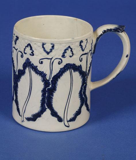 Appraisal: A SWANSEA BLUE AND WHITE TANKARD circa the cylindrical cabbage