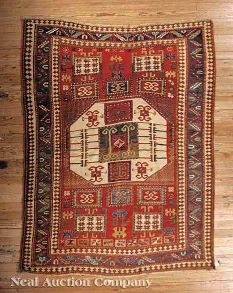 Appraisal: A Good Antique Carpet red and blue ground with repeating