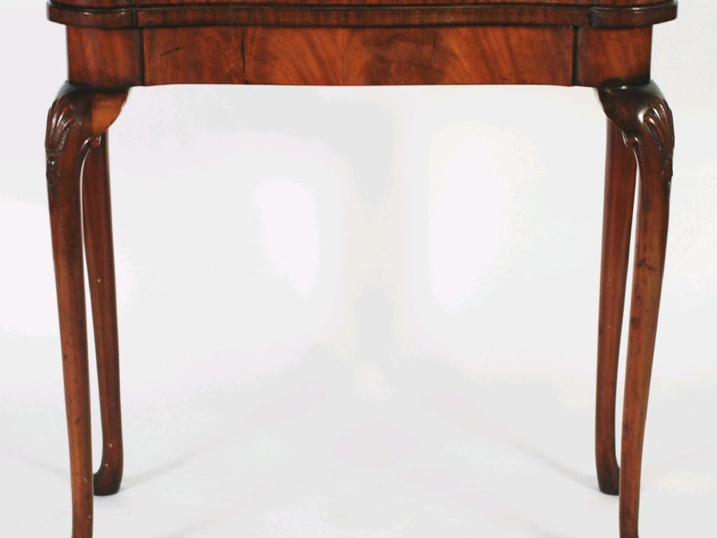 Appraisal: TWENTIETH CENTURY MAHOGANY GEORGIAN STYLE CARD TABLE of serpentine fronted