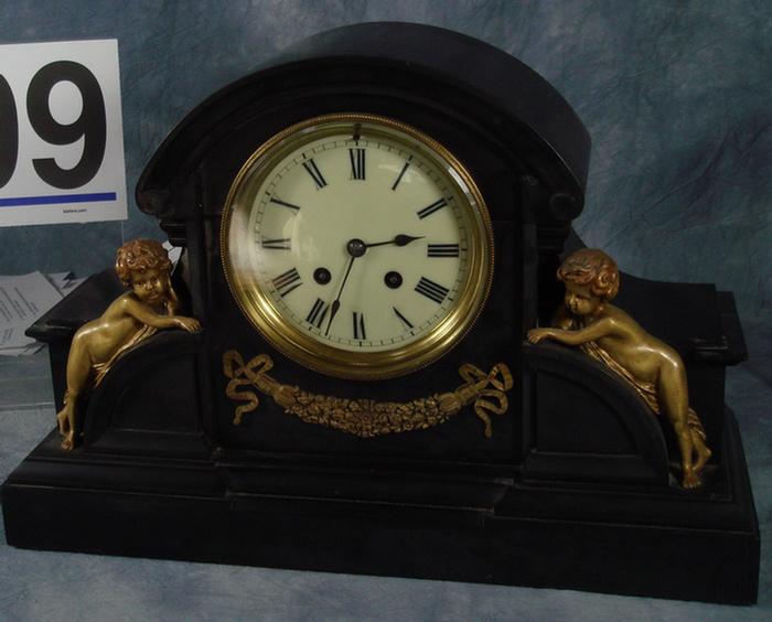 Appraisal: Black onyx French mantle clock enameled dial cherub gilt bronze