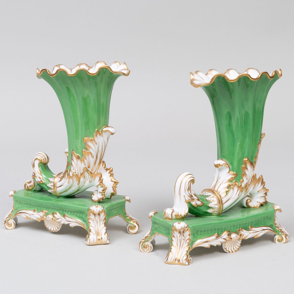 Appraisal: Pair of English Porcelain Apple Green Ground Cornucopia Vases on