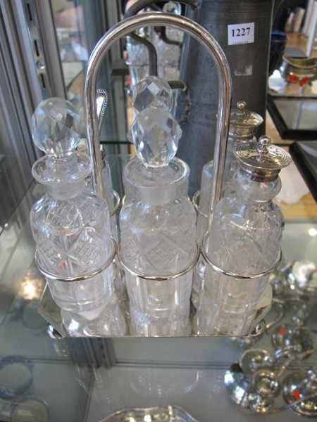 Appraisal: EP AND CUT GLASS SIX BOTTLE CRUET SET