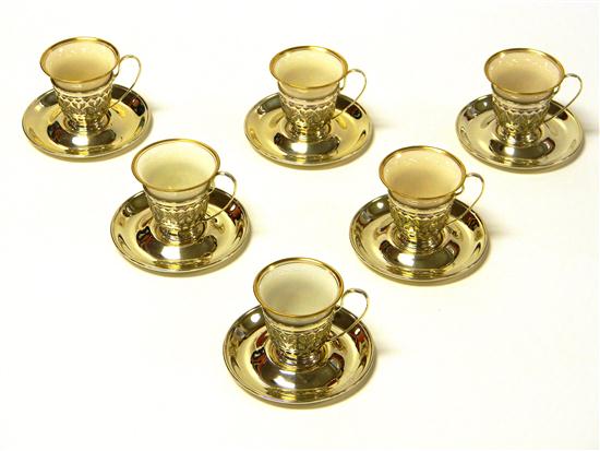 Appraisal: Six Lenox porcelain demi-tasse cups gilt rims with companion sterling