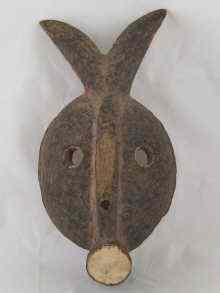 Appraisal: A carved wooden tribal mask with twin horns