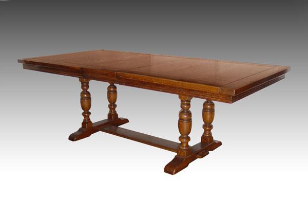 Appraisal: OAK TRESTLE DINING TABLE WITH LEAF Large family table extends