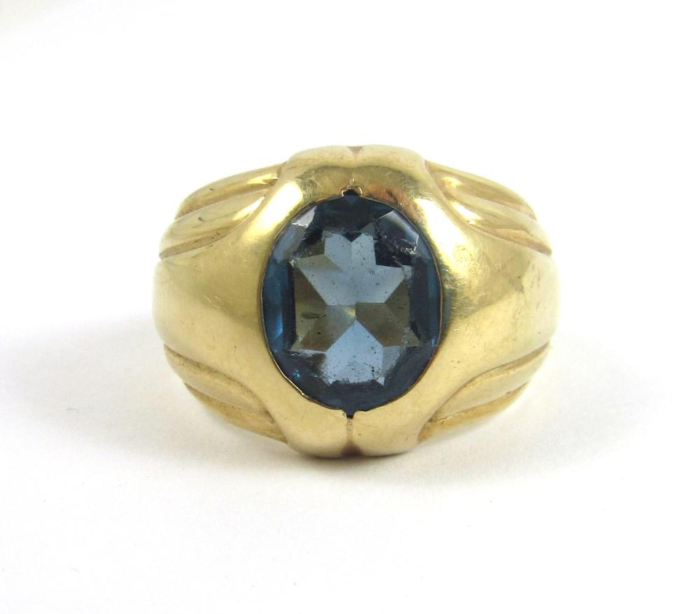 Appraisal: MEN'S BLUE SPINEL AND FOURTEEN KARAT GOLD RING The heavy