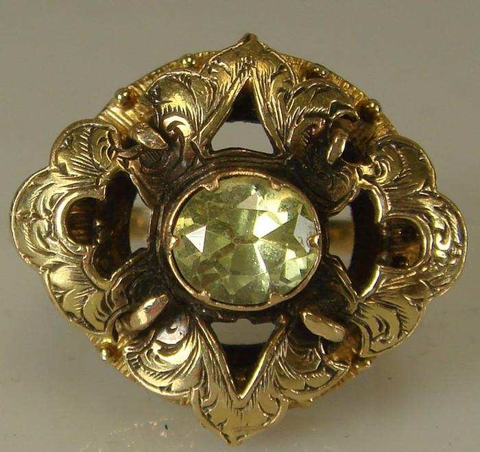 Appraisal: K yg Peridot Ring Assembled with chase work centered with