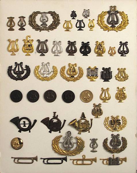 Appraisal: A group of Musician's insignia Comprising examples in brass gilt