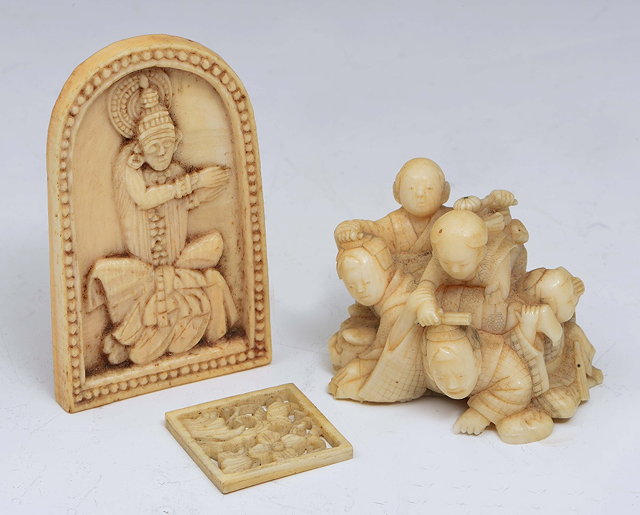 Appraisal: A JAPANESE IVORY OKIMONO a playful family group Meiji cm