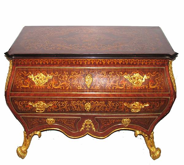 Appraisal: A German marquetry style commode with bronze mounts height in