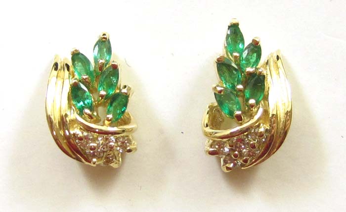 Appraisal: PAIR OF EMERALD AND DIAMOND EARRINGS each k yellow gold