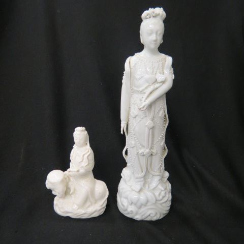 Appraisal: Chinese Porcelain Figurine of Quan Yin seated on foo dog