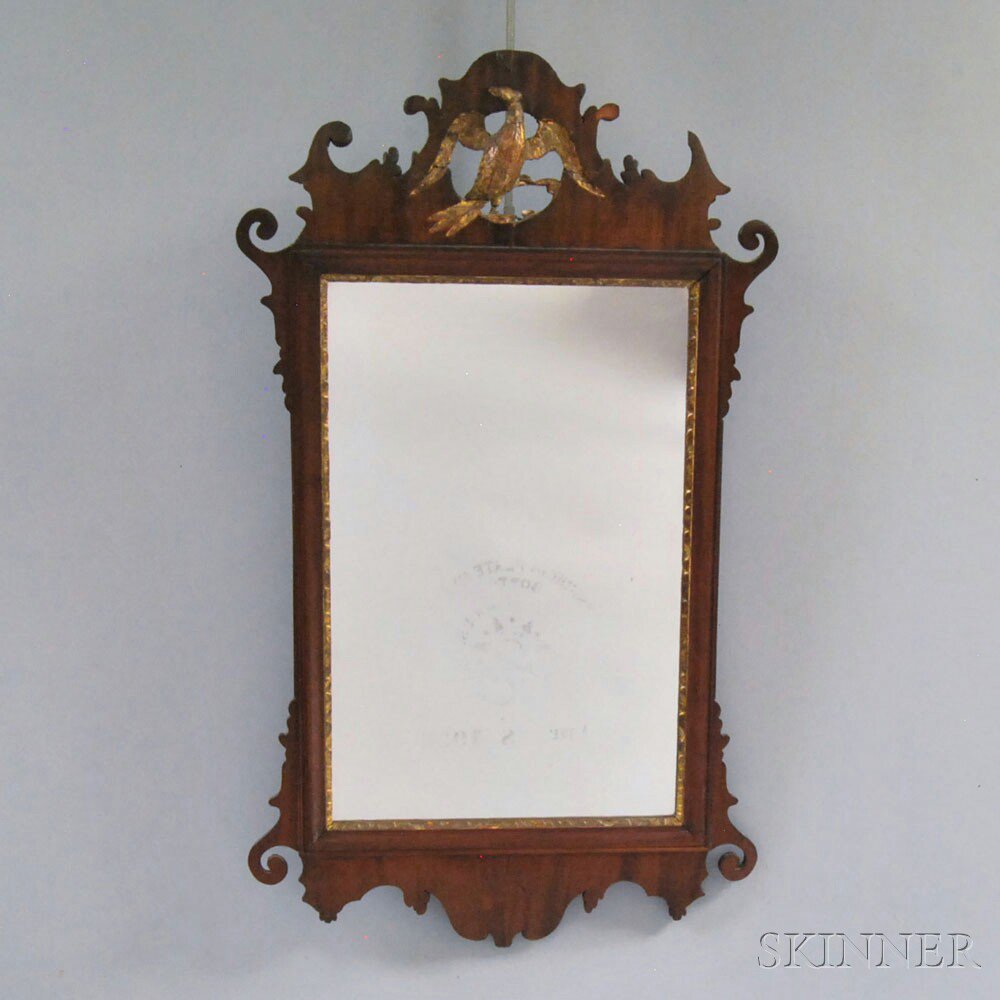 Appraisal: Chippendale Carved Mahogany Veneer Scroll-frame Mirror th century the scrolled