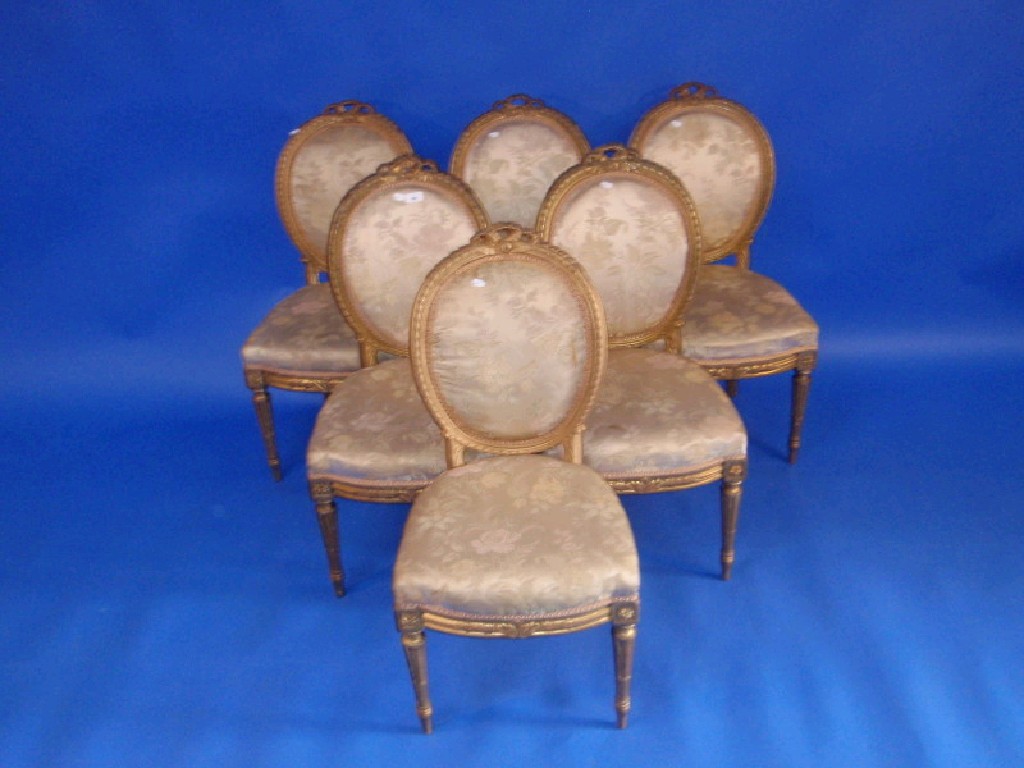 Appraisal: A set of six thC French gilt wood dining chairs