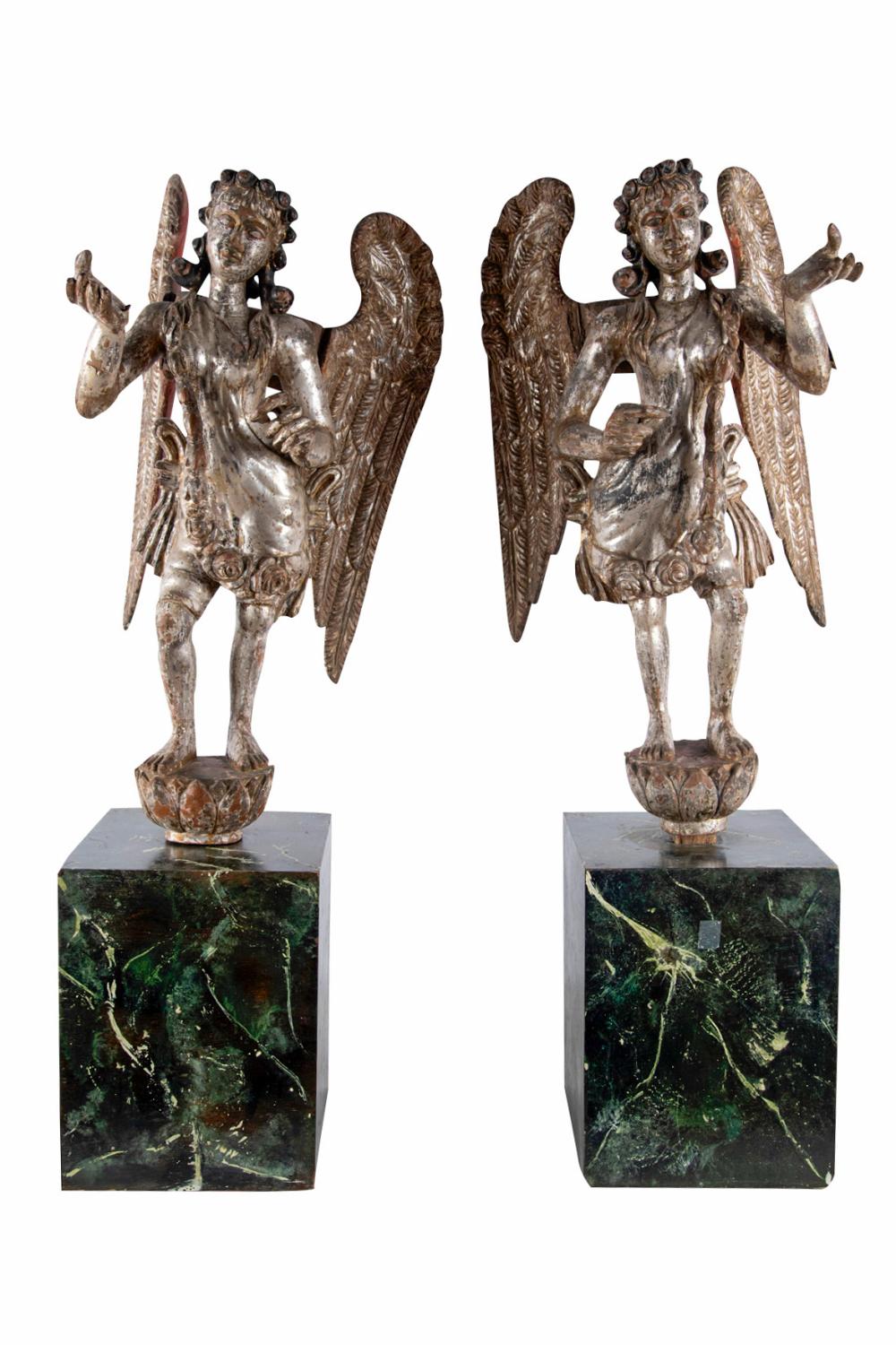 Appraisal: PAIR OF COLONIAL SILVER-GILT WOOD FIGURESeach mounted to a green