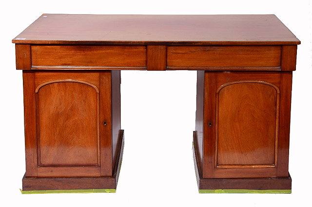 Appraisal: A VICTORIAN MAHOGANY PEDESTAL WRITING DESK with rectangular top the